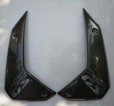 BMW R1300GS carbon fiber air intake guard for motorcycle protection.